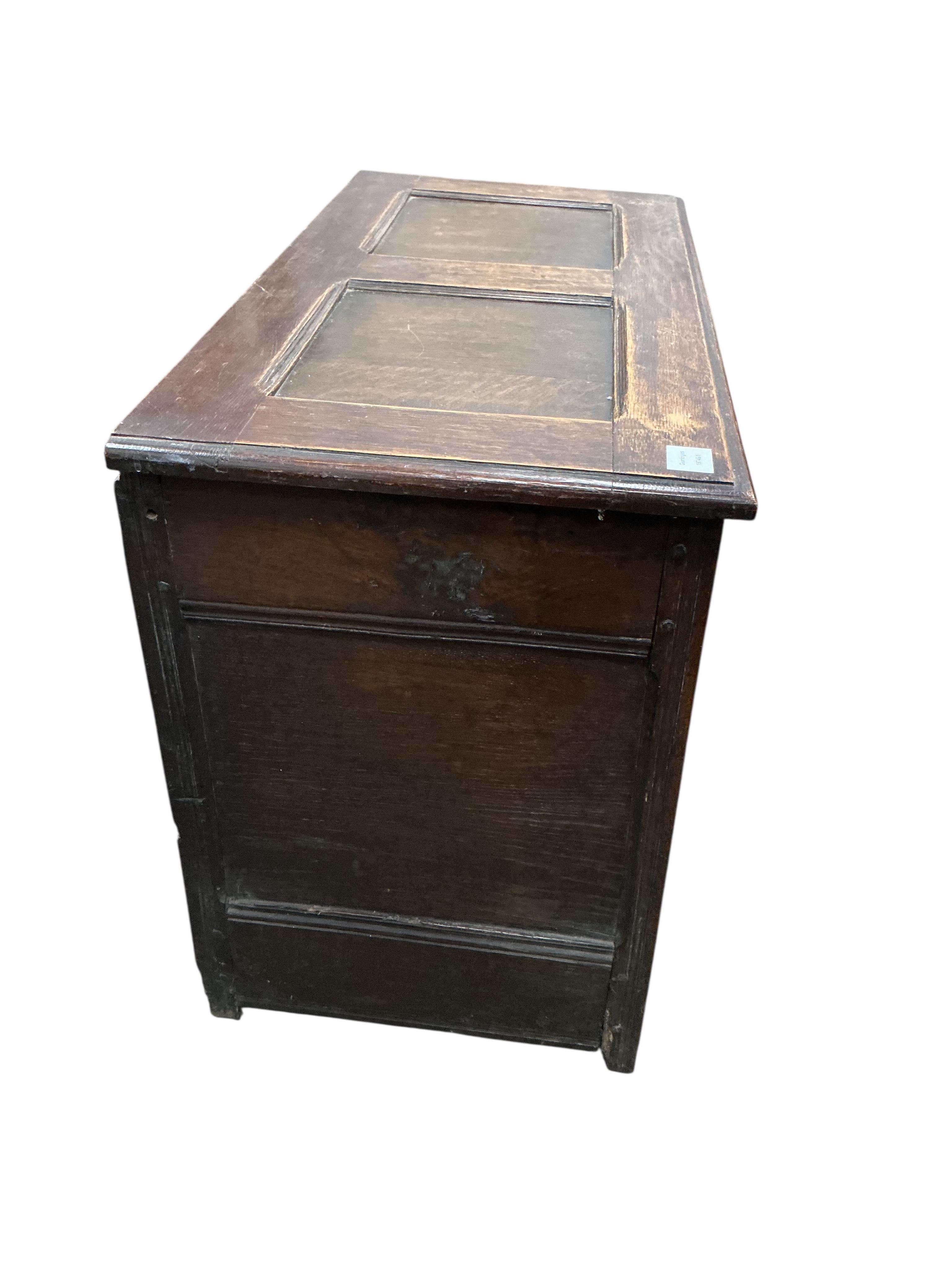 A small 18th century style panelled oak coffer, width 94cm, depth 45cm, height 66cm